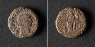 A weathered, ancient Greek Imperial coin from Egypt. The front (left) shows a laureate head wit…
