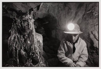 Tin miner and Tio, Bolivia