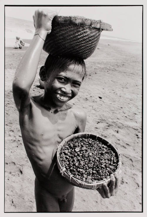 Collecting pumice stones, Indonesia