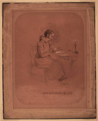 Portrait of Charles Dickens seated at table