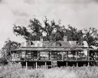 The abandoned Trepagnier plantation house now occupied by Negroes, Norco, LA....