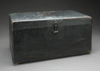 Wooden box covered with paper